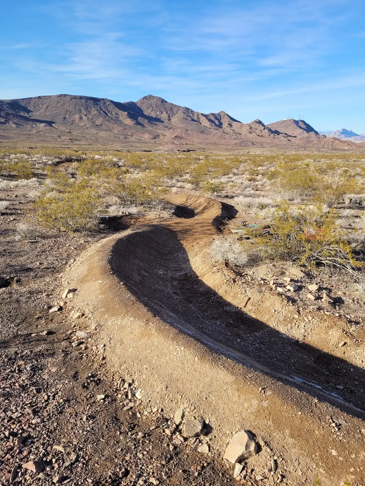 Desert singletrack threading through Sloan Canyon National Conservation Area